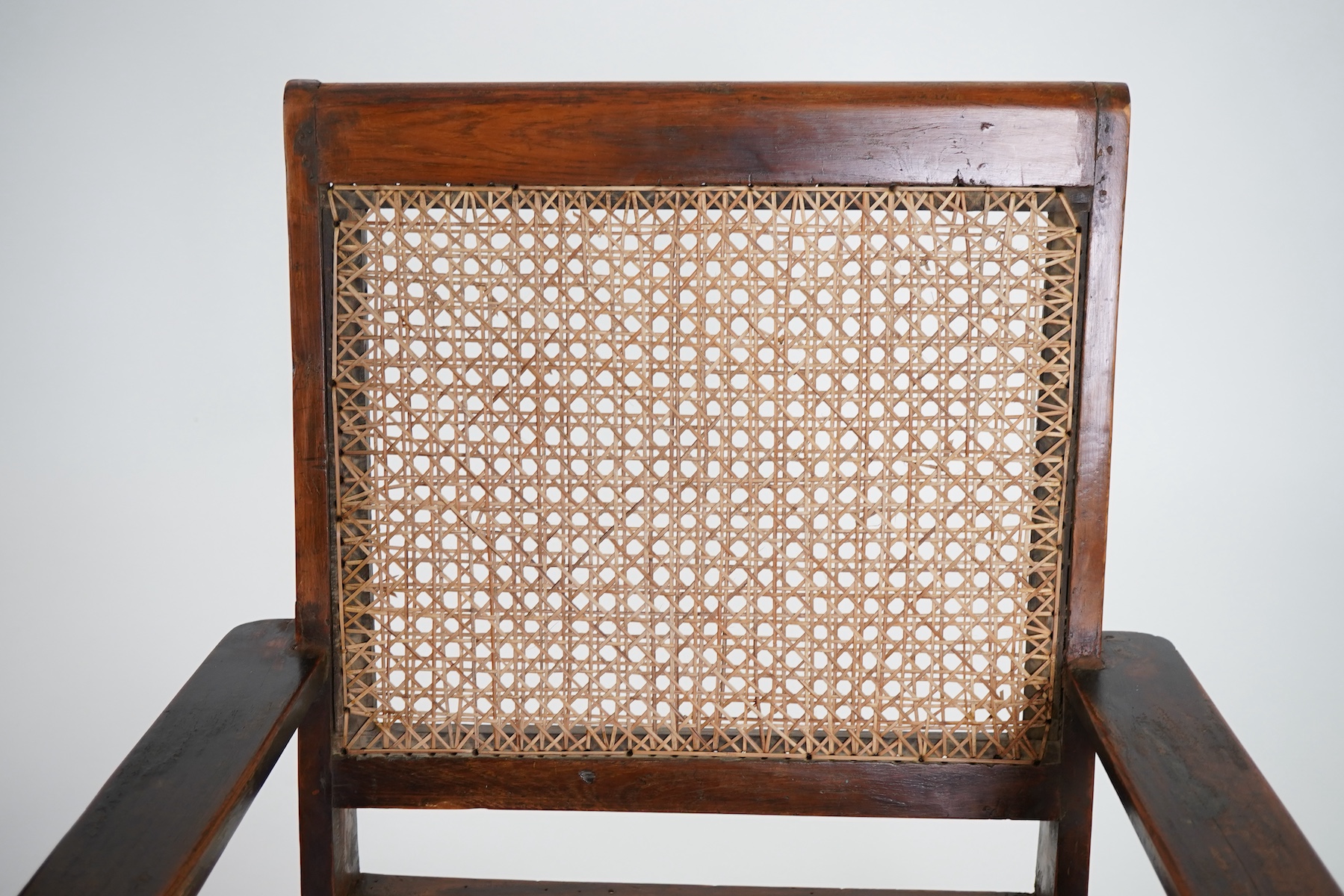 Pierre Jeanneret (Swiss, 1896-1967) for Chandigarh: A pair of teak armchairs PJ-010610